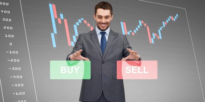 business, technology, finance and people concept - smiling businessman or stock broker over forex chart projection